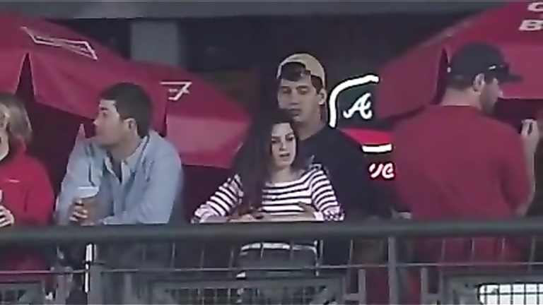 Having sex at a baseball game