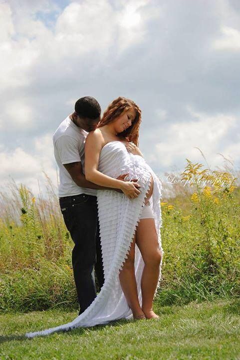 Interracial pregnant couple