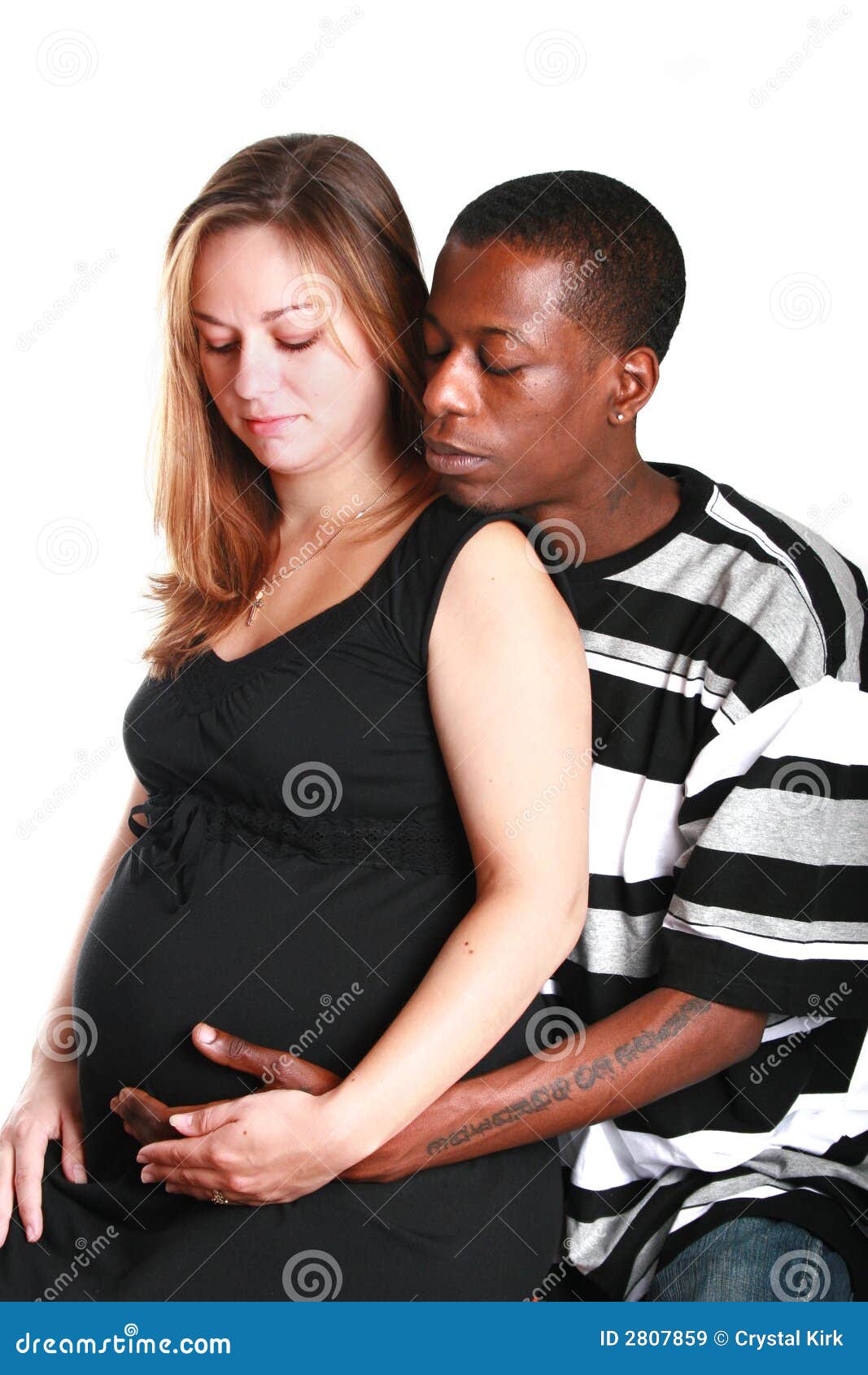Interracial pregnant couple